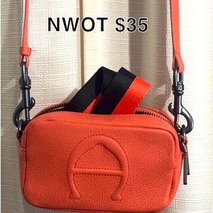 Etienne Aigner crossbody. Salmon colored.
